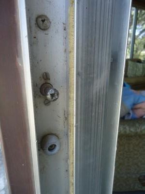 Acorn patio door keeper with rubber bumpers