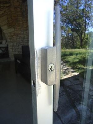 Acorn patio door with hole for keeper
