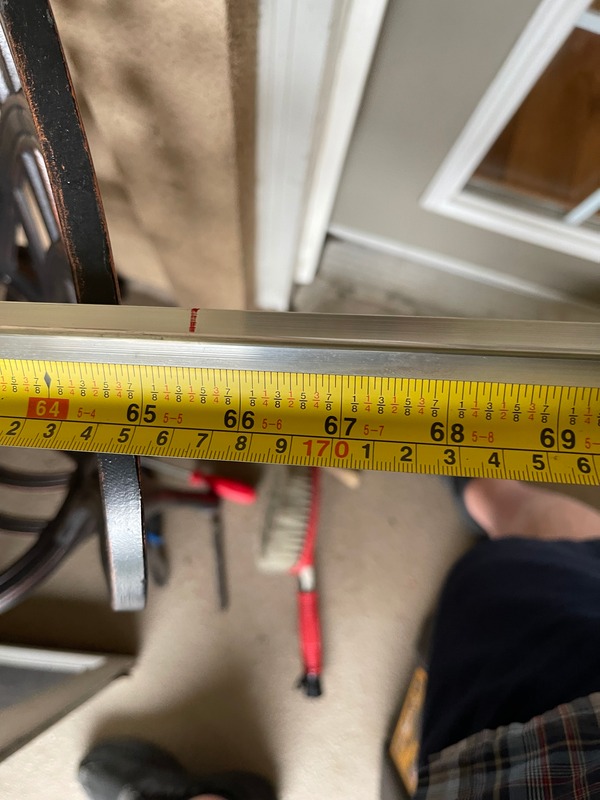 Marking the screen door track for a french door so it can be cut to length