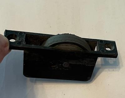 Garage sliding door screen roller