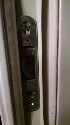1148-8 flat faceplate lock installed in vinyl door
