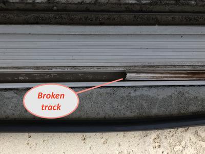 Plastic screen door track embedded in channel