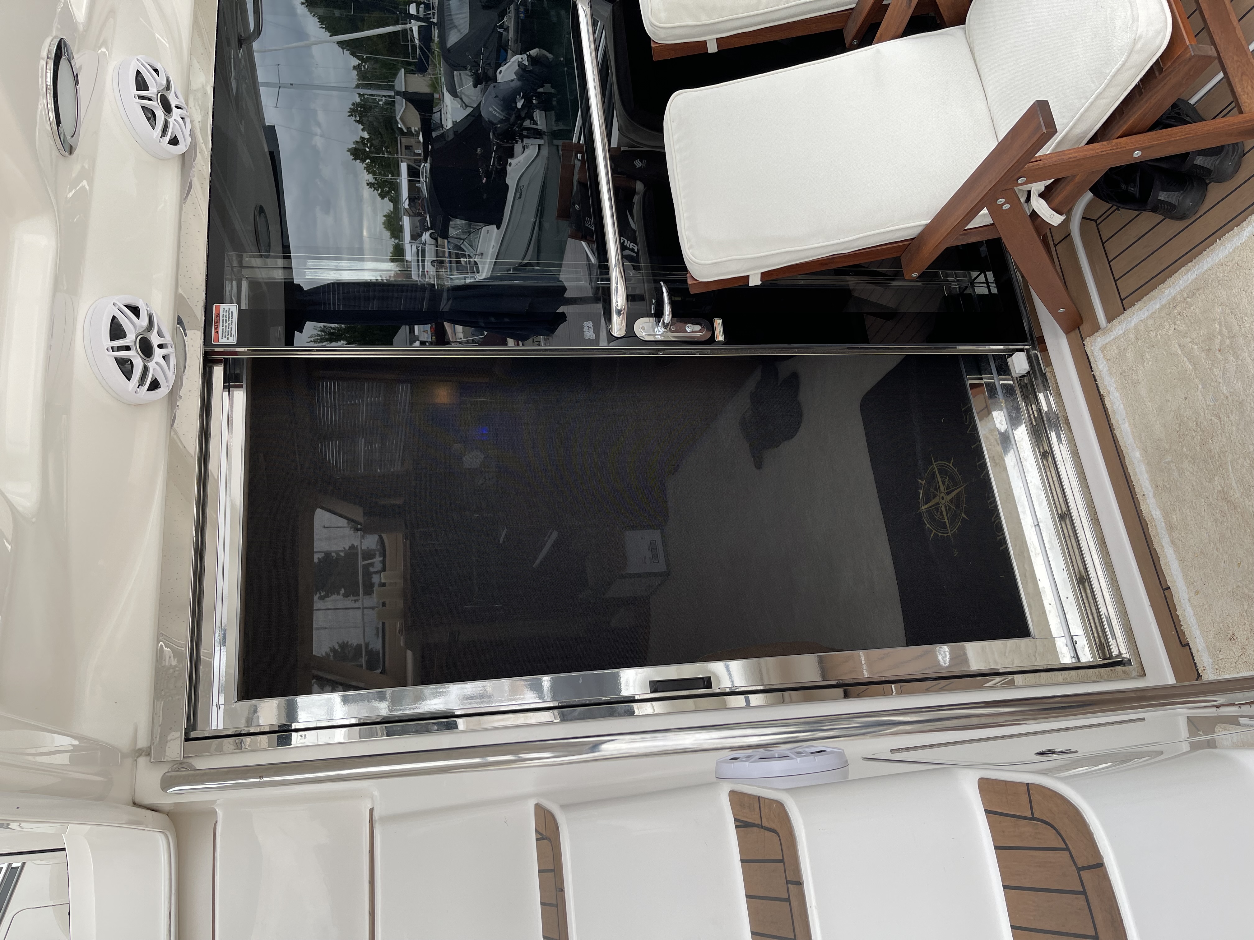 Sea Ray Cabin Cruiser Screen Door with silver vinyl wrap