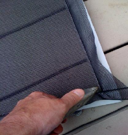 Trimming a corner of a screen using a utility Knife